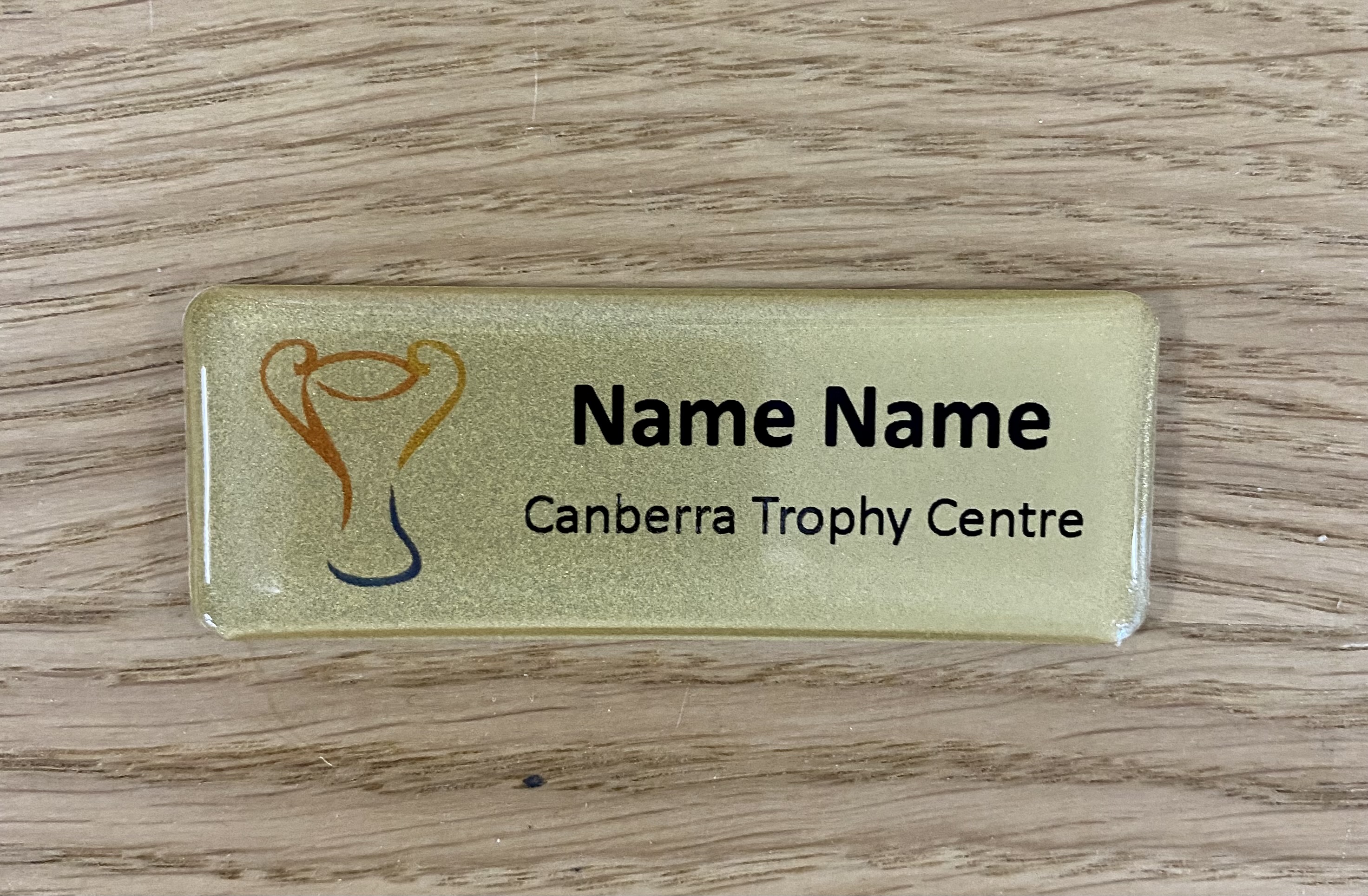 NAME BADGE GOLD DOME