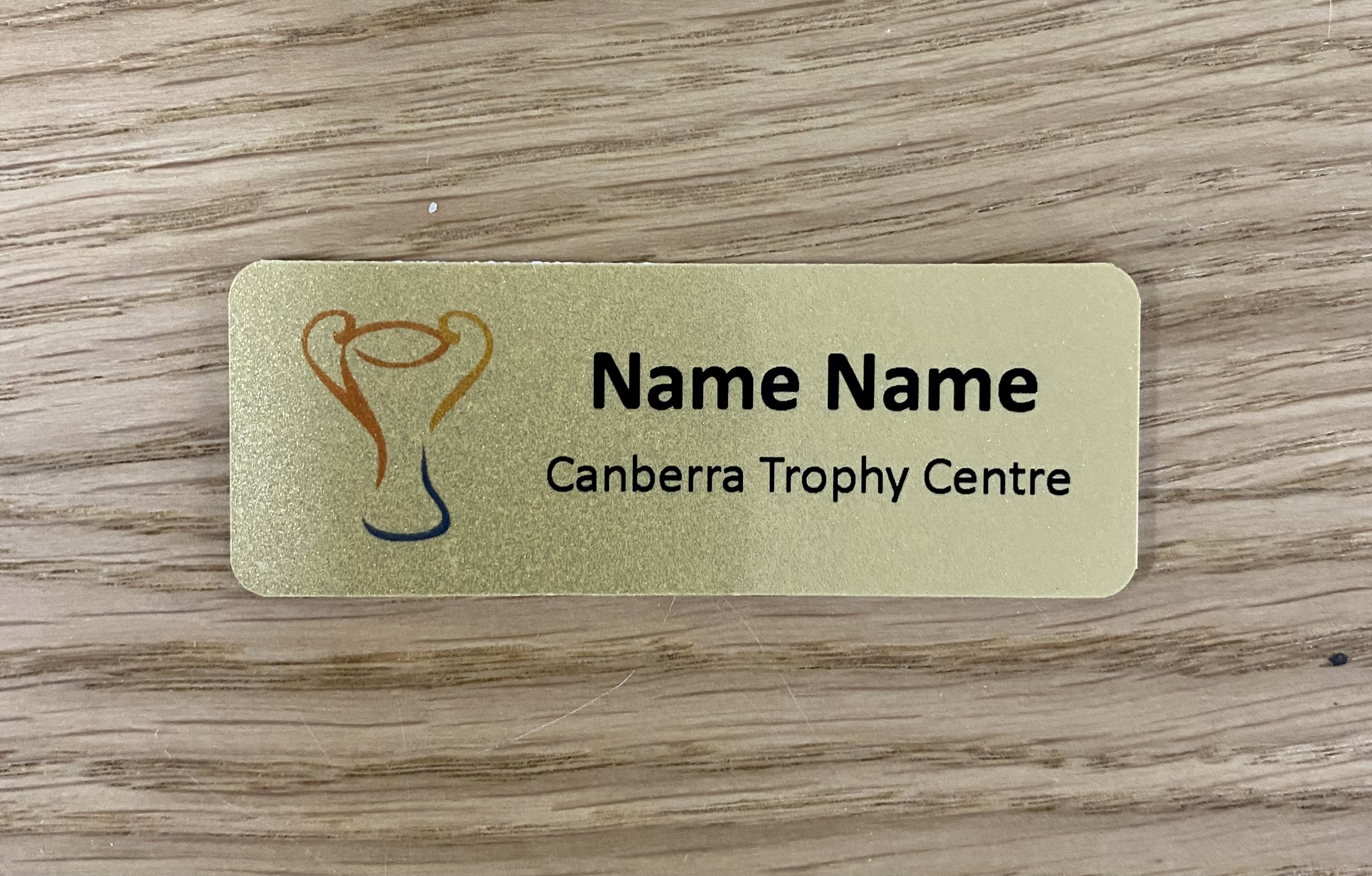 NAME BADGE GOLD FLAT